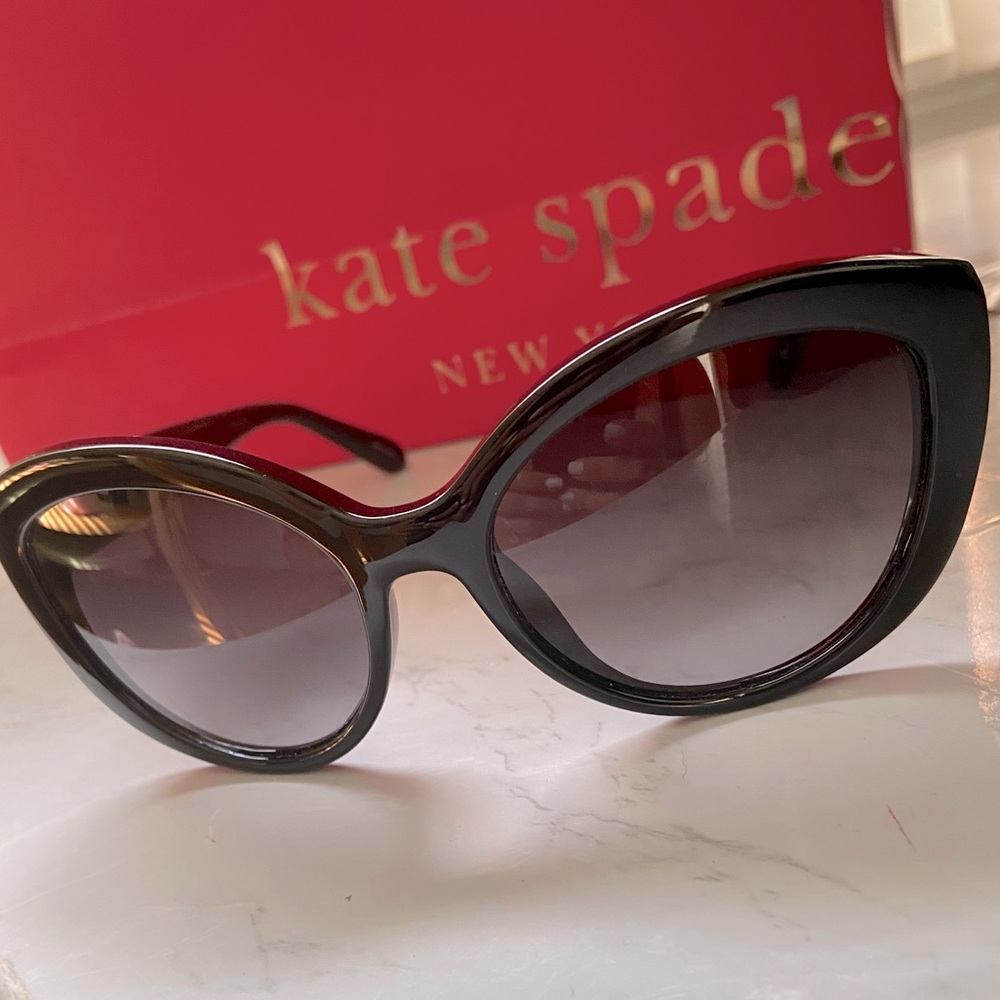 Kate Spade new without tags Sherrie sunglasses. Never worn. Comes with case.